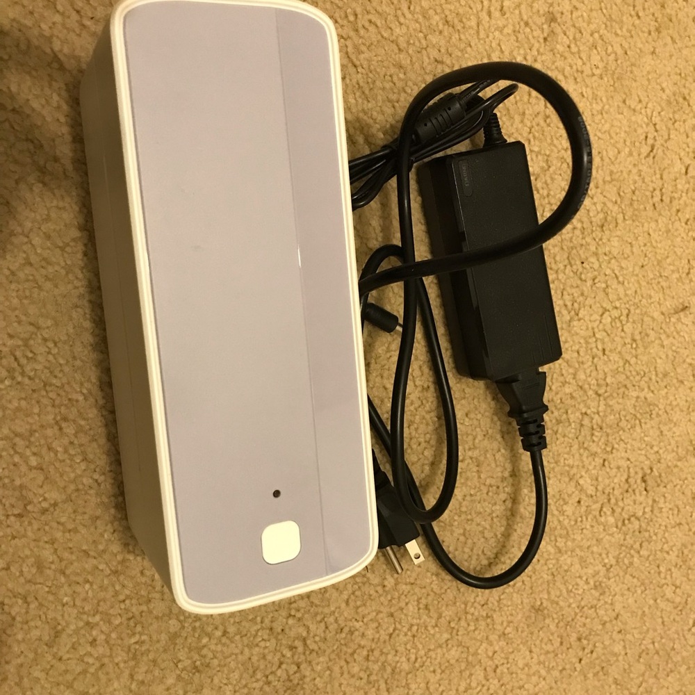 White and Gray Electronic Device with Power Adapter